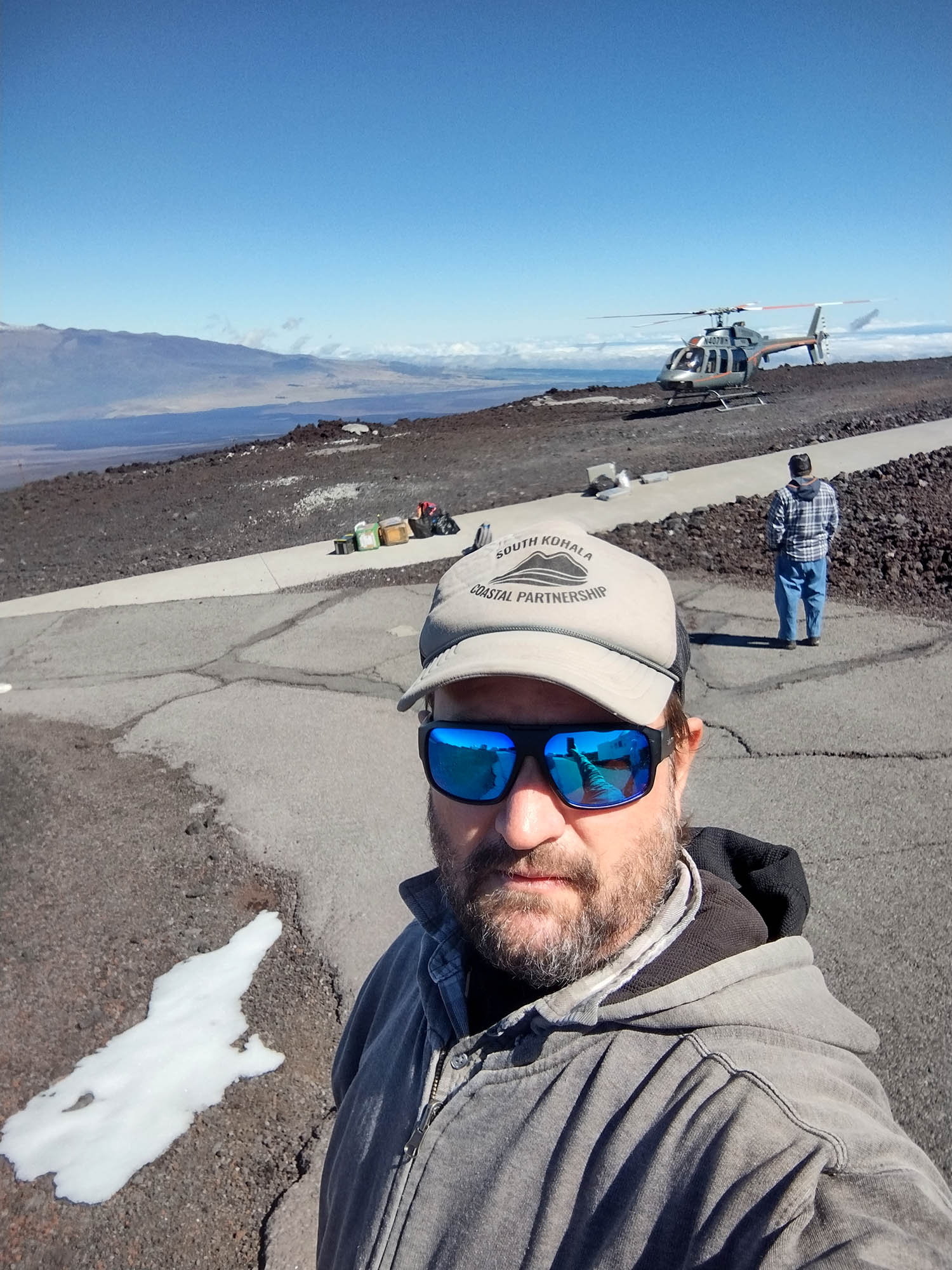 Ben Berkey and NOAA personnel arrive at the Mauna Loa Observatory (MLO)