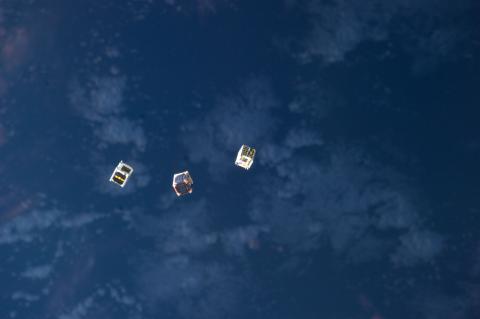 CubeSats in orbit above Earth