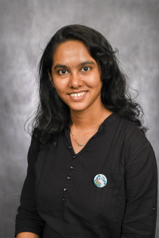 Upper body pose of a smiling Sreelakshmi