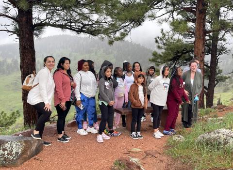 Sponsored Kidwind 2023 students enjoying a group photograph behind the Mesa Lab